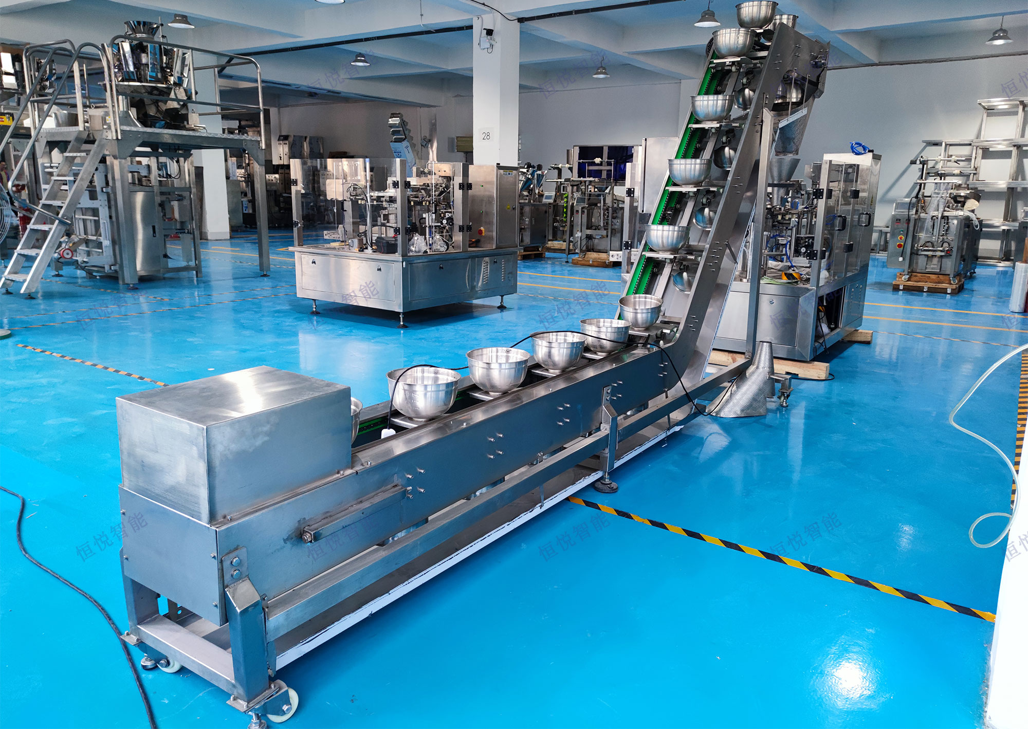 組合秤自動定量稱重丝瓜视频污污污污是一種集成高精度稱重與自動化包裝功能的設備